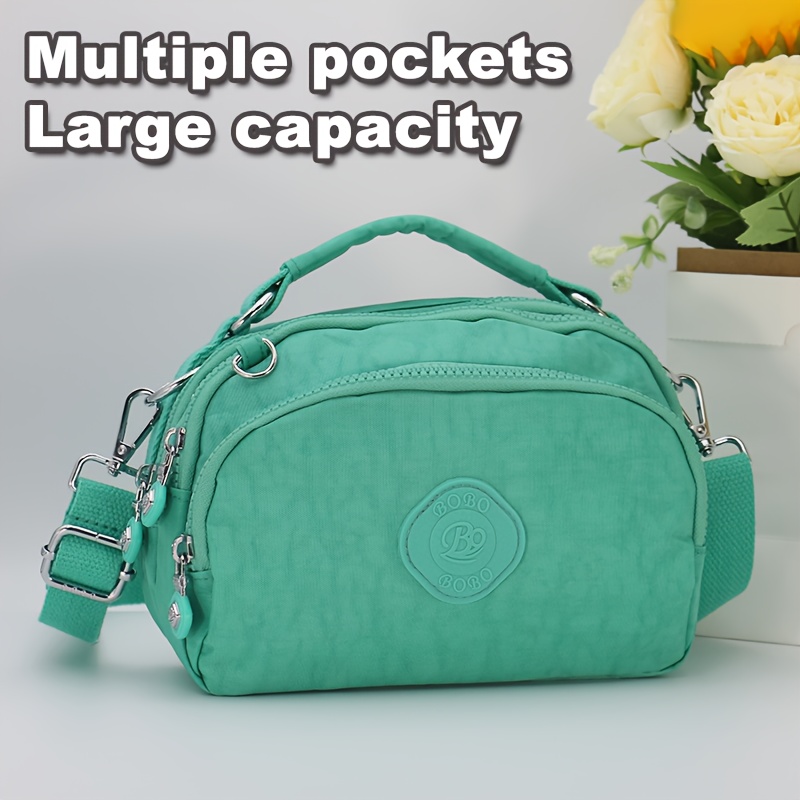 Party Games Switch - Damen-Umhängetasche aus Nylon mit mehreren Taschen,